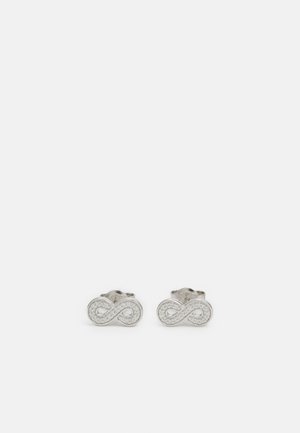 Pendientes de plata en forma de símbolo de infinito, con una superficie texturizada y adornados con pequeñas piedras transparentes.