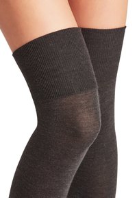 Knee-high socks in dark gray, featuring a ribbed texture at the top and a smooth finish on the leg portion. Material appears soft and stretchy.