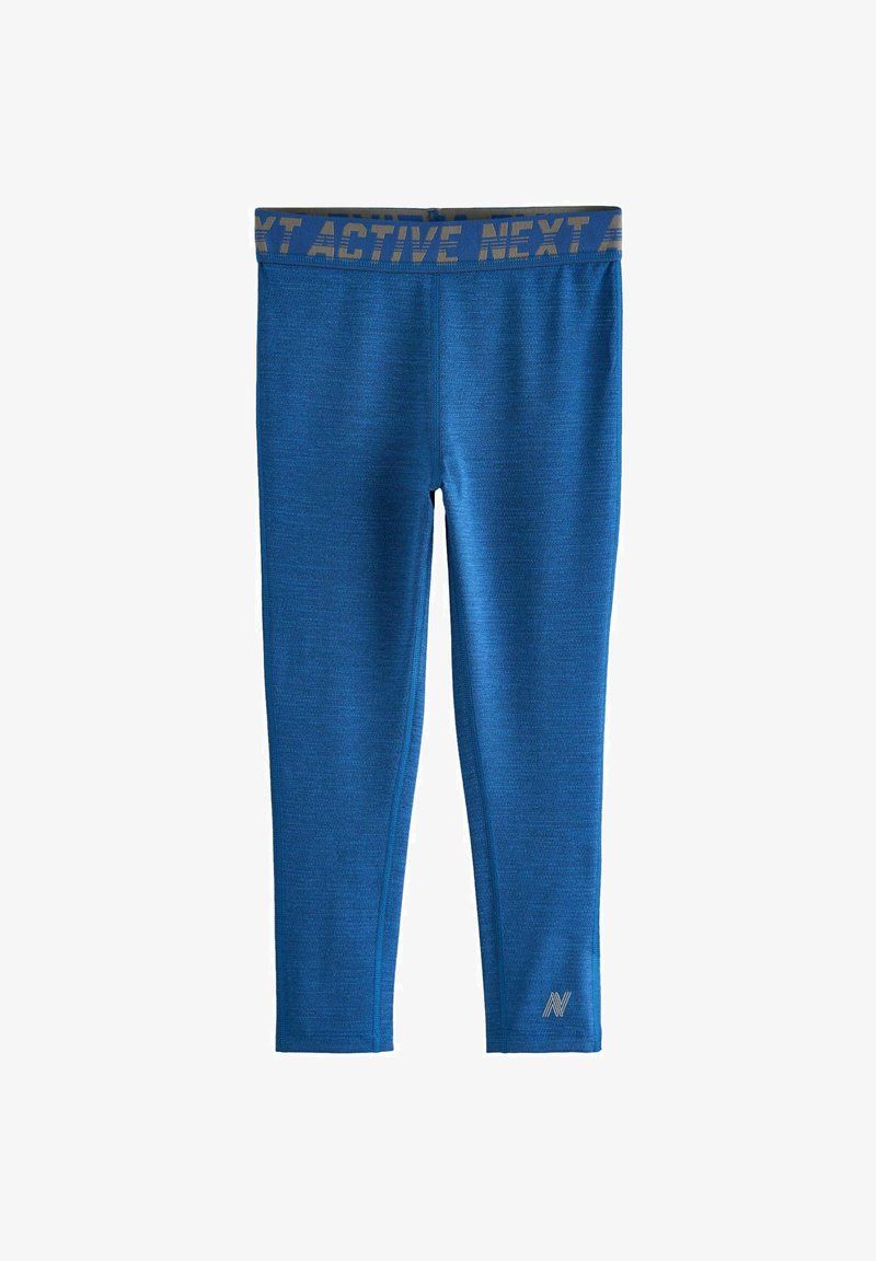 Siniset aktiiviset legginsit, jotka on valmistettu venyvästä kankaasta. Niissä on joustava vyötärö, jossa on "NEXT ACTIVE" -teksti ja pieni logo yksityiskohta helmassa.