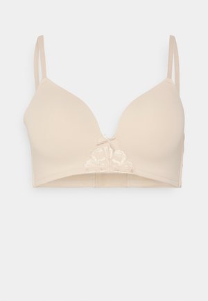 Beige padded bra with a smooth texture, plunging neckline, and lace accent at the center front. Adjustable straps for fit customization.