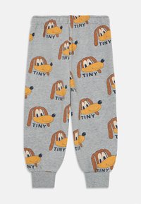 Graue Baumwoll-Sweatpants mit einem verspielten, sich wiederholenden Muster von Cartoon-Hundeköpfen, jeweils mit dem Text "TINY" darunter. Mit elastischen Bündchen ausgestattet.
