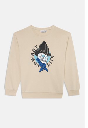 Beige hettegenser med et grafisk design av et kranium som har på seg en svart cowboyhatt og blå bandana, med teksten "COWBOY LIFE" rundt designet.