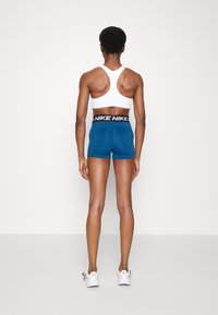Nike Performance SHORT - Leggings - valerian blue/black/white