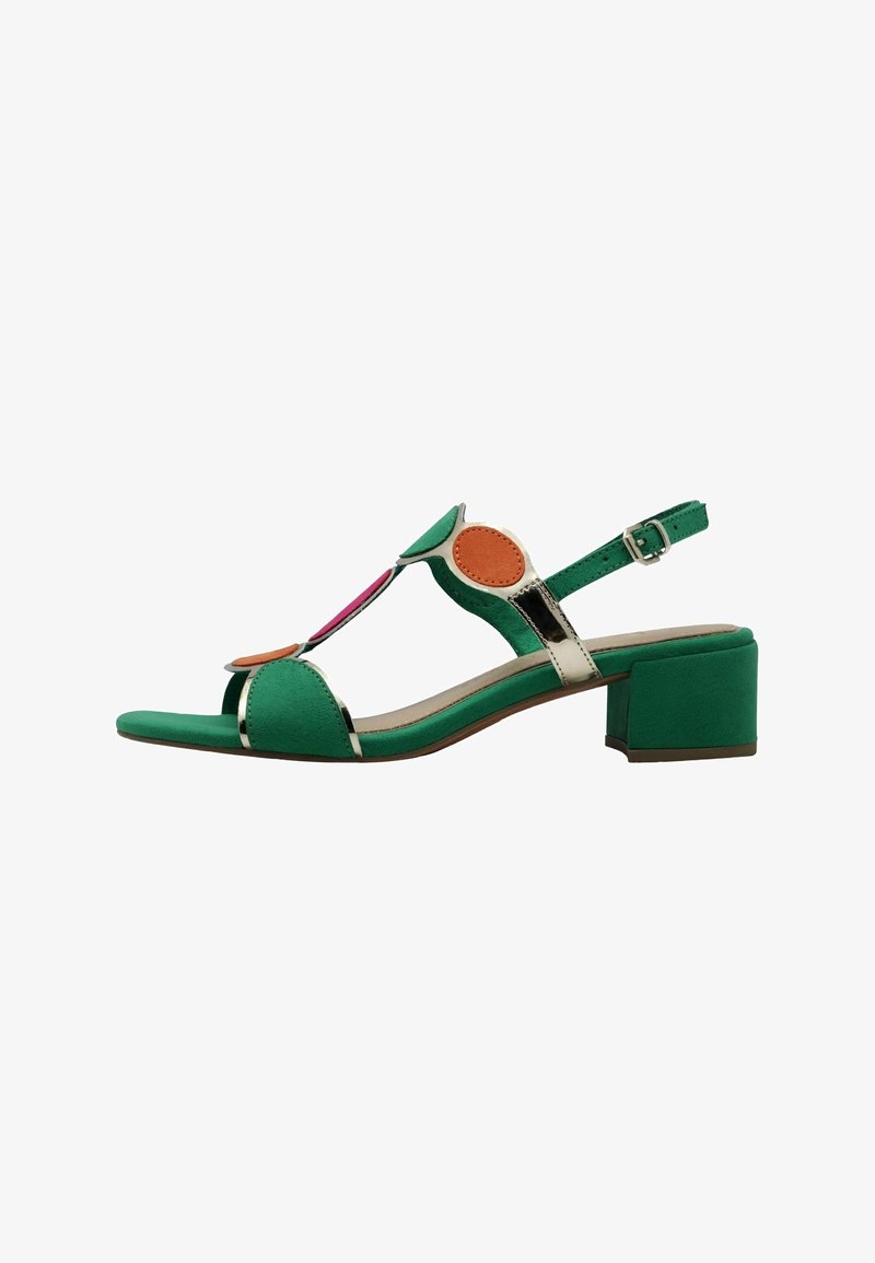 Sandale verte à bout ouvert avec un petit talon bloc, bride de cheville ajustable et décorations circulaires orange, rose et blanches sur les brides.