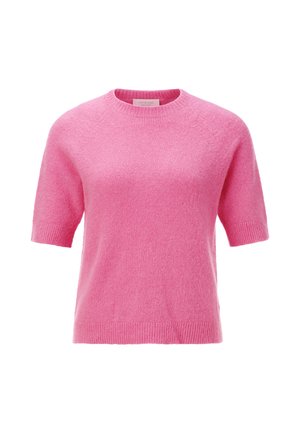 Pull en rose à manches courtes fabriqué dans un matériau doux et duveteux. Il présente un col rond et un ourlet côtelé, mettant en avant une coupe légère et décontractée.