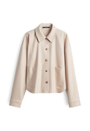 Beige verkürzte Blusenjacke, hergestellt aus glattem Stoff, mit einem spitzen Kragen, Knopfleiste, zwei großen Fronttaschen und langen Ärmeln.