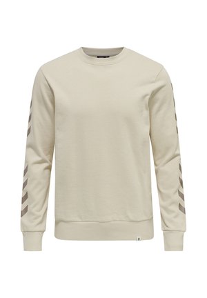 Beige crewneck sweatshirt med lange ærmer og mørke chevronmønstre, der løber ned ad begge ærmer.