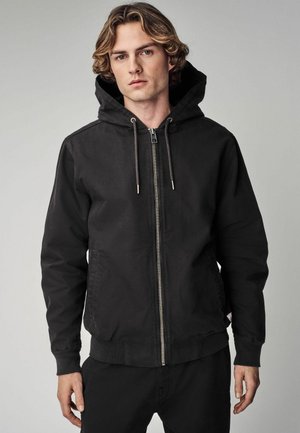 Next REGULAR FIT HOODED THROUGH WORKER - Giacca leggera - black