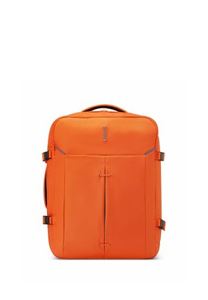Bright orange rectangular travel bag with front side pockets, side compression straps, and a top carrying handle.