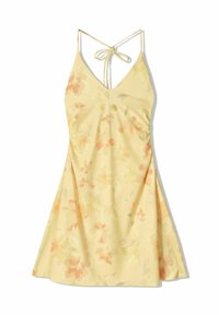 Robe florale jaune avec un décolleté en V et des fines bretelles. Elle présente une taille cintrée et une jupe évasée. Le motif comprend des fleurs orange clair.