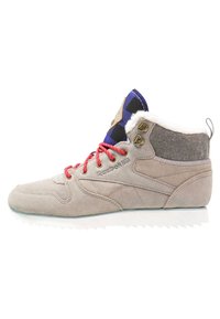 High-top sneakers with a light gray suede upper, red laces, gray wool collar, and a blue and black patterned fabric detail at the top.