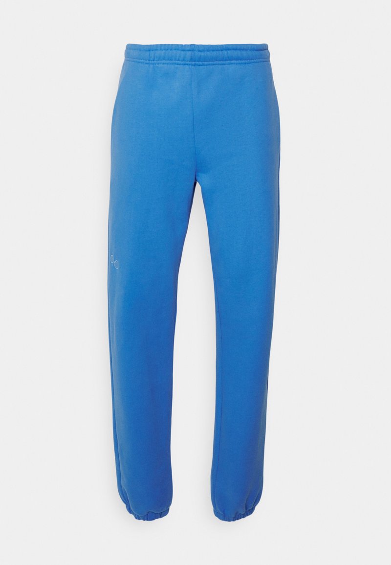 Blaue Sweatpants aus weichem Stoff, ausgestattet mit einem elastischen Bund und gerafften Bündchen, mit einem schlichten Design ohne sichtbare Muster oder Akzente.