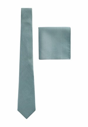 Light blue textured necktie and matching pocket square laid flat on white background.