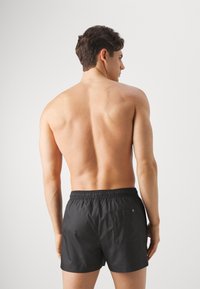 Calvin Klein Swimwear DRAWSTRING - Swimming shorts - black