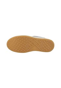 Rubber sole with a textured, zigzag pattern; light color with a contrasting tan/brown underside; curved shape along the edge.