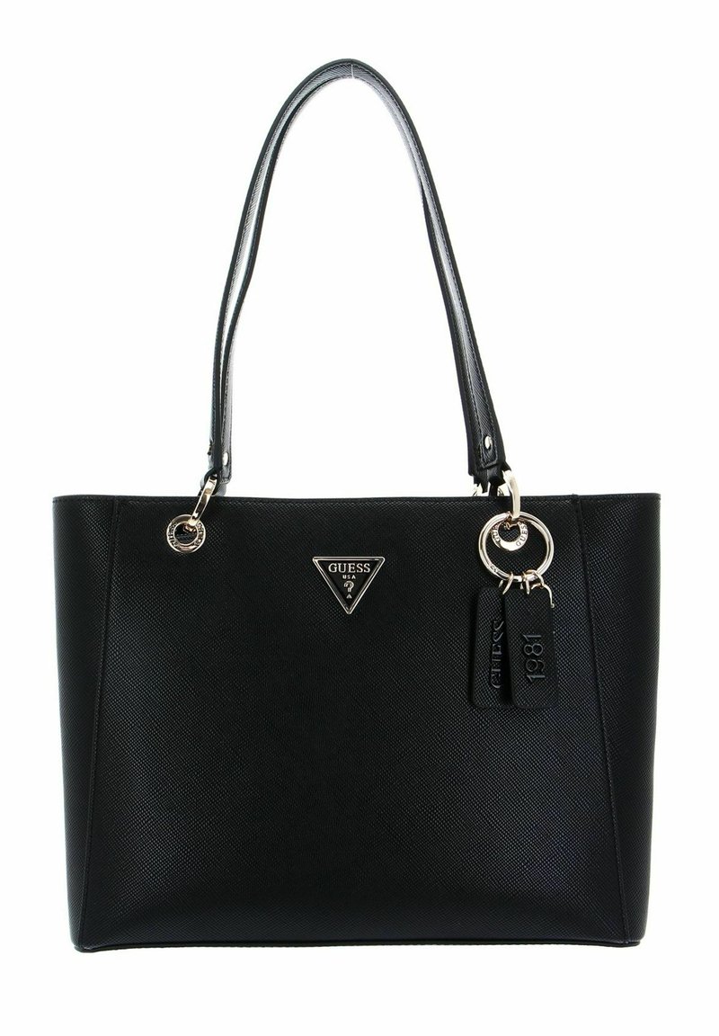 Sac fourre-tout noir en synthétique avec texture lisse, deux poignées et quincaillerie métallique. Présente un logo triangulaire et des accents de porte-clés décoratifs.