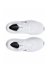 White athletic shoes with a mesh upper, laces, and black accents. Features "Comfort Deluxe System" on the insole and a rounded toe design.