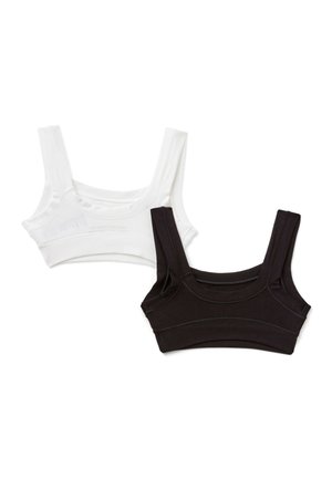 Due bralette corti in bianco e nero, con spalline spesse, design senza cuciture e tessuto morbido ed elastico.