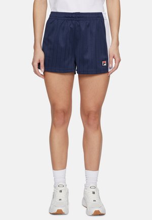 Tummansinisiä urheilushortseja, joissa on pystysuorat raidat. Elastinen vyötärö ja pieni logopatch vasemmalla puolella. Materiaalin näyttäisi olevan kevyt.