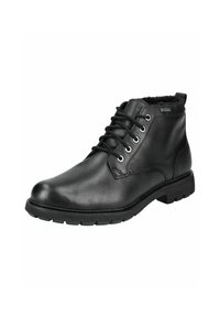 Botines de cuero negro con un acabado suave, puntera redonda, diseño con cordones y suela de goma con textura en la suela. Forro interior suave.