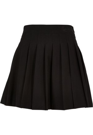 Jupe plissée noire avec une large ceinture haute et un détail de couture subtil, conçue pour un usage décontracté ou semi-formel.