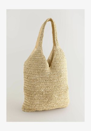 Tkaná taška na rameno v přírodní béžové barvě, s jemně texturovaným povrchem, dvojitými ramenními popruhy a prostorným, neupevněným designem.