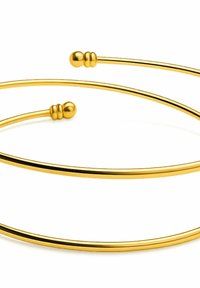 Gullfarget metallarmbånd med to glatte, avrundede ender, som har et lett vridd design og en blank overflate, som gir en minimalistisk estetikk.