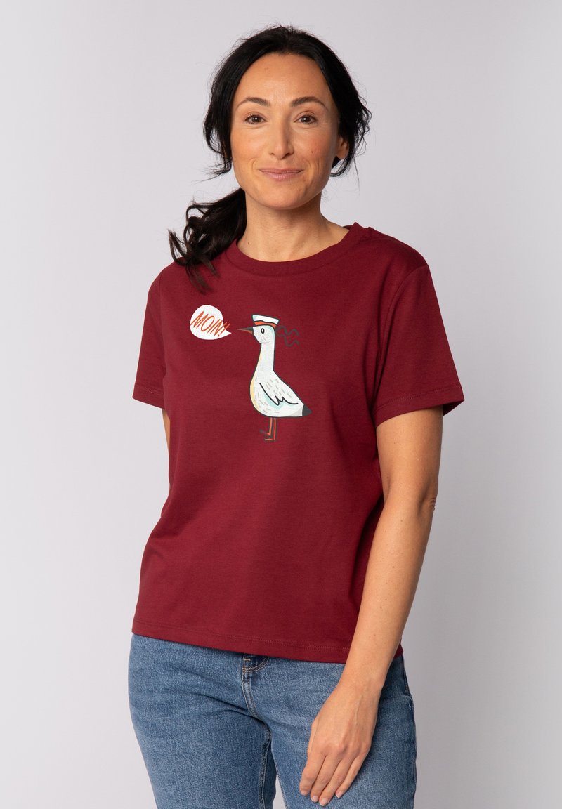 Burgunderfarbendes Baumwoll-T-Shirt mit einem weißen Möwen-Graphic und einer Sprechblase, die "MOM!" sagt. Kurze Ärmel, Rundhalsausschnitt, lässige Passform.