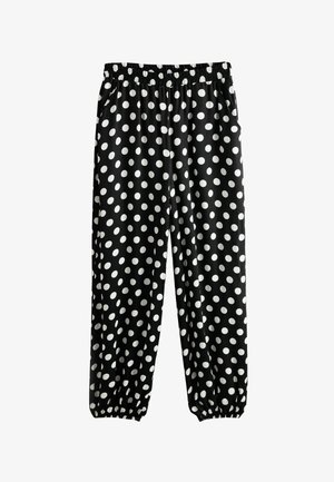 Fekete nadrág fehér pöttyökkel, rugalmas derékpánttal és boka mandzsettákkal, valamint oldalzsebekkel.