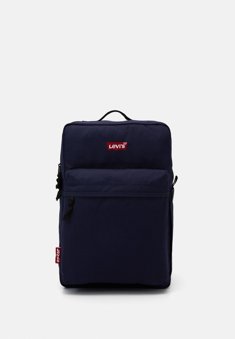 Navy blue fabric backpack with a prominent red Levi's logo, single top handle, and front zip pocket. Rectangular shape and simple design.