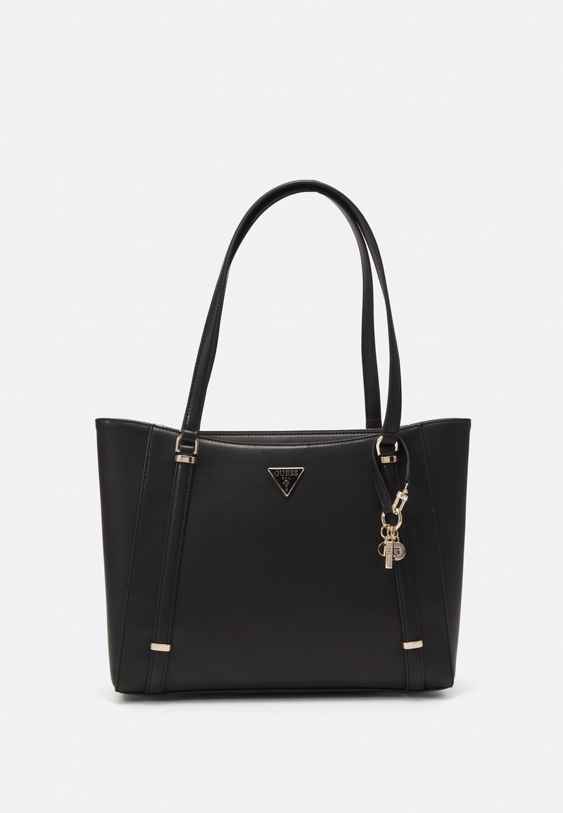 Black faux leather tote bag with dual shoulder straps, gold hardware, and a logo plaque. Features a zipper and keychain detail.