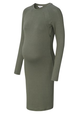 Schwangerschaftskleid, lange Ärmel, aus olivgrünem Stoff. Figurbetontes Design mit seitlichem Reißverschluss für einfaches An- und Ausziehen. Sanfte Textur, knielang.