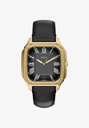 Square gold watch with black dial, Roman numerals, date display at 6 o’clock, and black leather strap, showing 10:10:37.