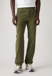Olive green, straight-leg pants made of cotton with a smooth texture. Features a flat front, belt loops, and a button closure.