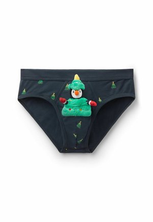 Calzoncillos negros de algodón para hombre con bordado de árbol de Navidad verde y un detalle de pingüino de peluche en el frente, con guantes rojos y un sombrero verde.