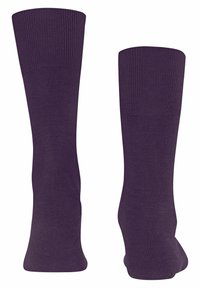 Calzini viola con una texture liscia e una parte superiore a coste. Presentano un design tradizionale al ginocchio, caratterizzato da un colore uniforme senza motivi.