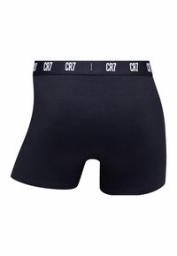 Black cotton boxer briefs featuring a white CR7 logo waistband, smooth texture, and a fitted design.