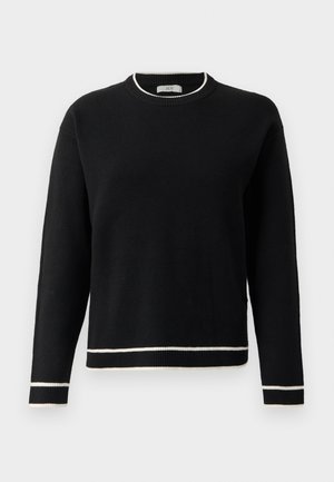 Suéter negro de manga larga con cuello redondo y ribete blanco en el cuello, los puños y el dobladillo, exhibido sobre un fondo blanco liso.