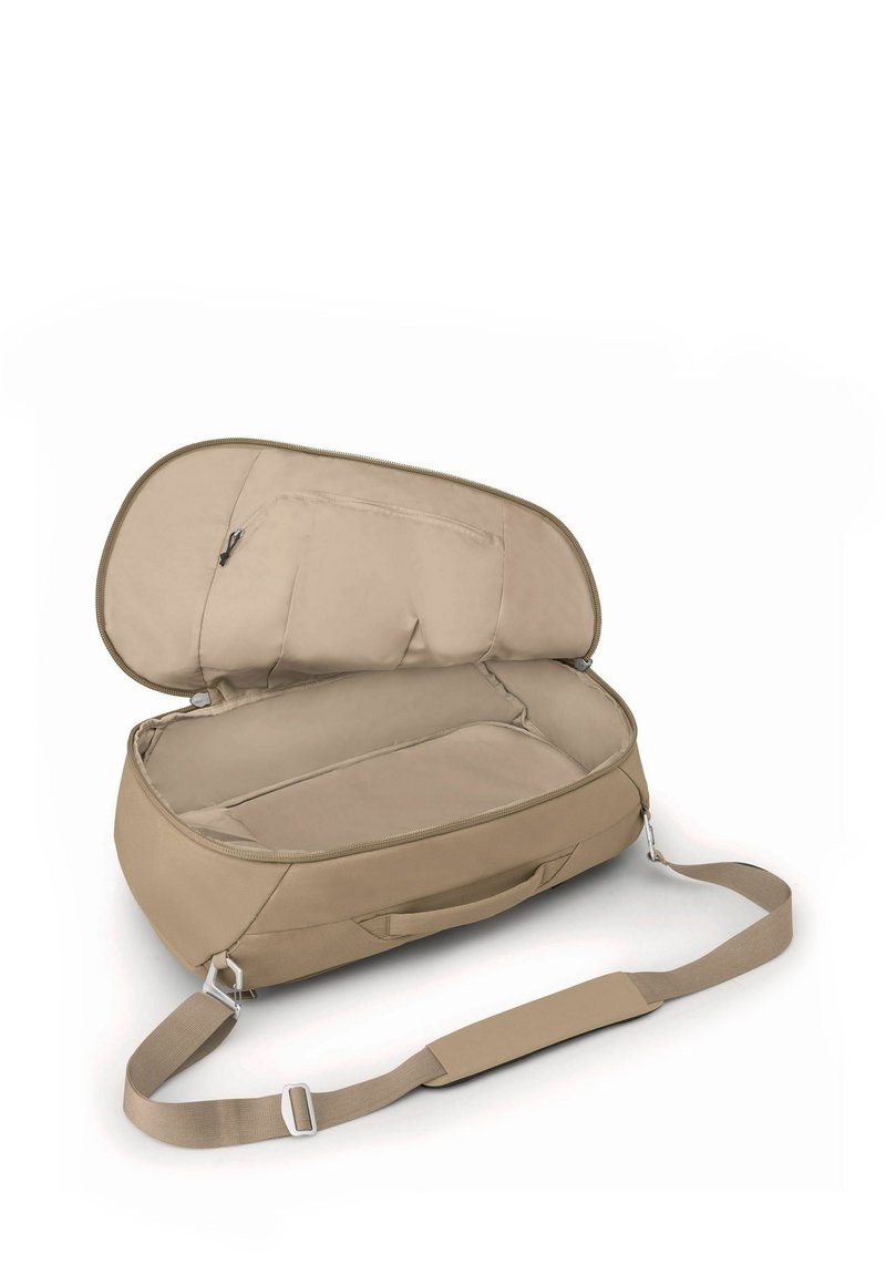 Beige Reisetasche aus strapazierfähigem Stoff, mit einem Reißverschluss, gepolstertem Innenraum und einem verstellbaren Schultergurt.