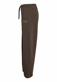 Ruske hlače od mekog materijala, s elastičnim pojasom i vezicom, te otisnutim logotipom "PARIZ" sa strane.