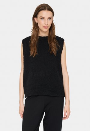 Black sleeveless top made of textured fabric, featuring an oversized fit and a round neckline. No visible hardware or patterns.