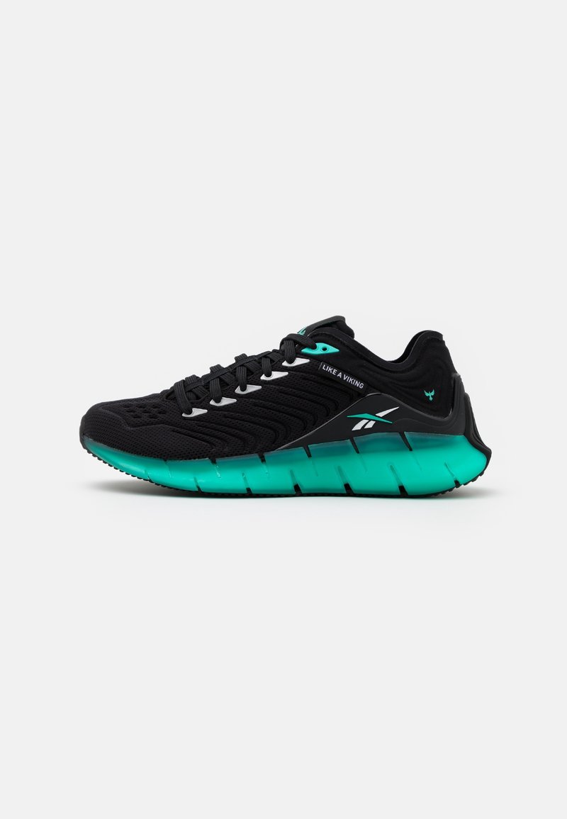 Black and turquoise athletic sneaker with textured upper, patterned sole, and "Like a Viking" text near laces on white background.