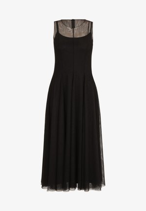 Schwarzes ärmelloses Kleid mit transparenter Bluse, tailliertem Schnitt und fließendem Rock. Reißverschluss im Rücken, strukturierter Stoff.