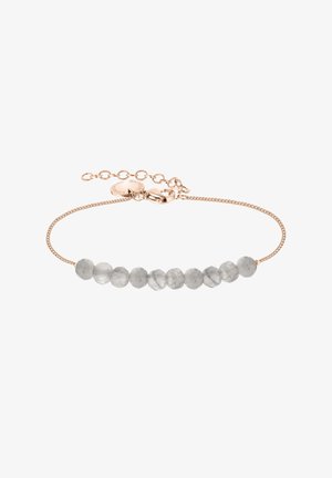 Bracelet délicat avec neuf perles grises semi-translucides rondes sur une fine chaîne en or rose et fermoir mousqueton avec chaîne d'extension.