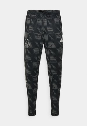 AJAX AMSTERDAM LFSTLR - Tracksuit bottoms - black