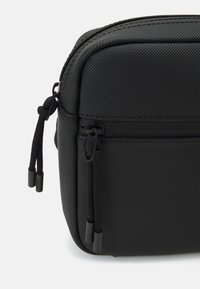 Lacoste REPORTER BAG UNISEX - Borsa a tracolla - noir