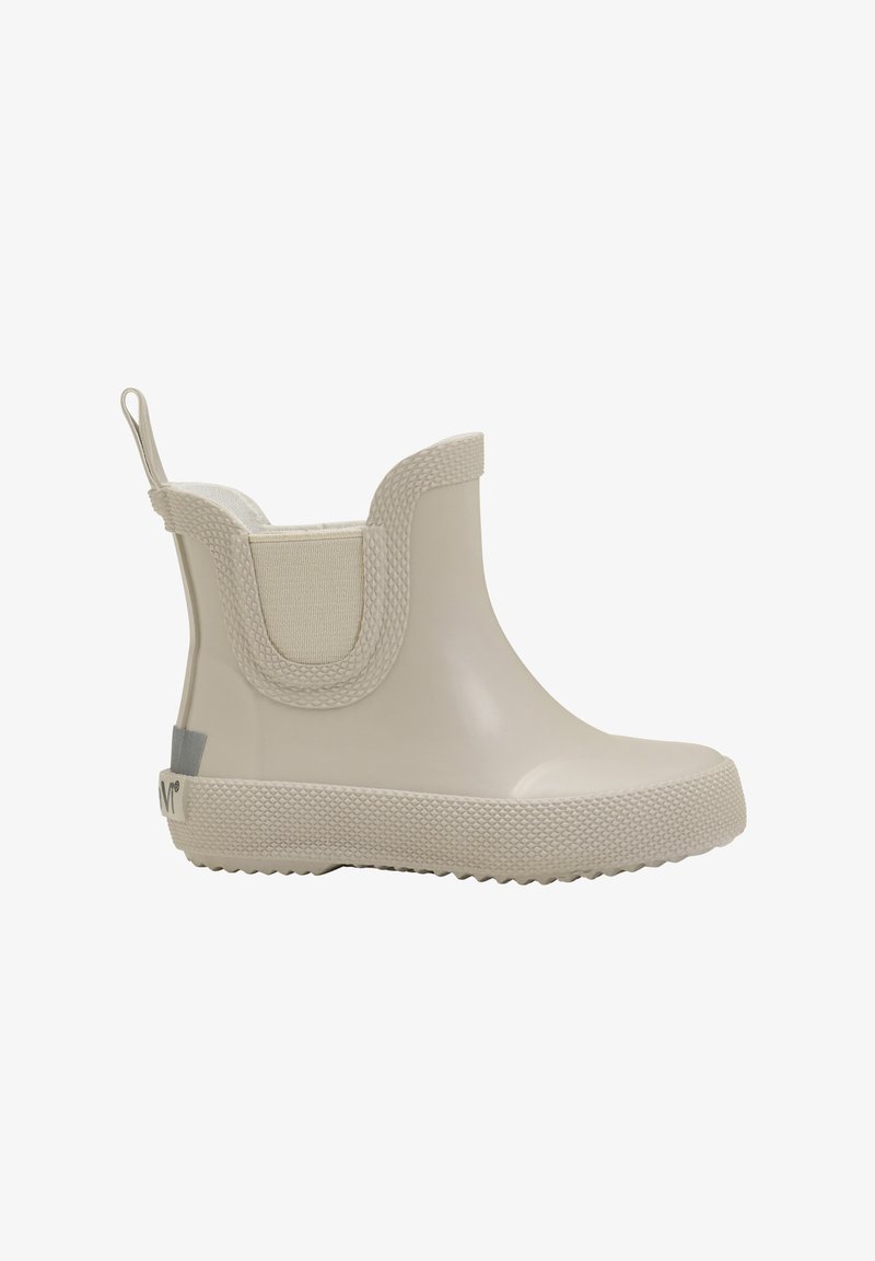 Bottines en caoutchouc beige avec des panneaux latéraux en élastique, surface texturée, languette de traction et semelle à motif pour une bonne adhérence. Conçues pour être résistantes à l'eau.