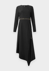 Black long-sleeve dress featuring a round neckline, asymmetrical hem, and golden accents along the waistline. Smooth fabric texture.