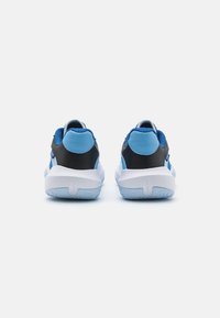 Black and blue athletic shoes with a textured finish, padded collar, and white midsole. Features a smooth rubber sole with grip pattern.