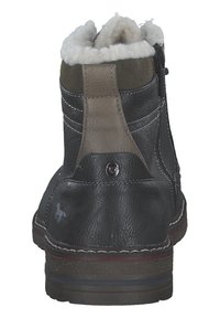 Black leather ankle boots with grey textile accents, plush white lining, side zipper, and contrasting welt stitching detail.